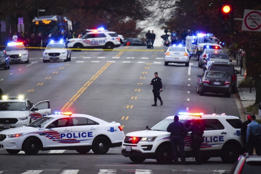 Police secure the scene near Comet Ping Pong in Washington