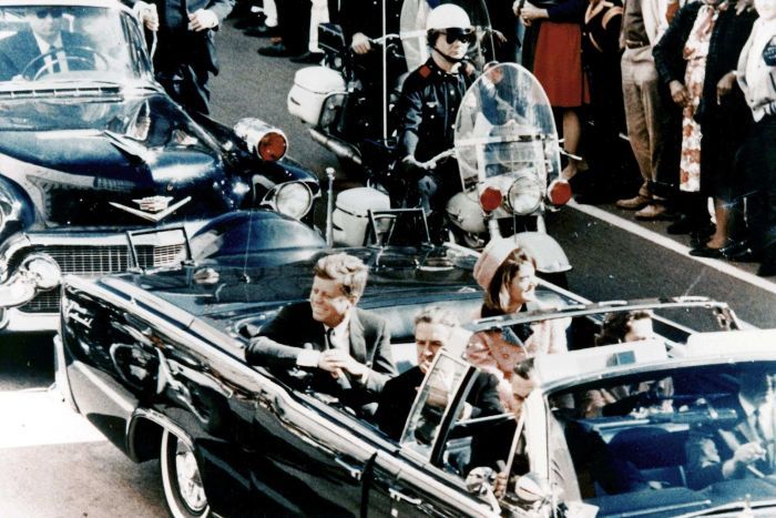 JFK and Jackie in the limousine as it makes its way through Dallas.