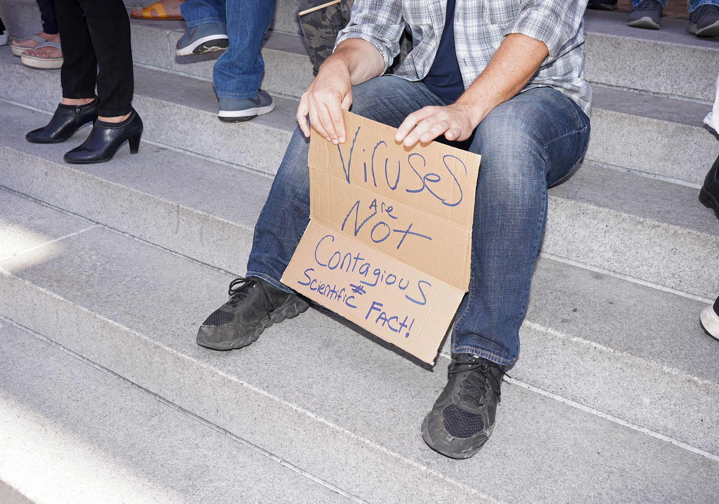 A protestor's sign at a rally calling for the reopening of California from coronavirus lockdown measures in Los Angeles, May 24, 2020.