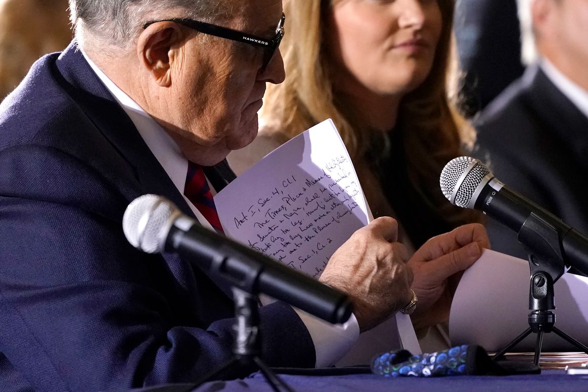 Former Mayor of New York Rudy Giuliani, a lawyer for President Donald Trump, notes are visible after he spoke at a hearing of the Pennsylvania State Senate Majority Policy Committee, Wednesday, Nov. 25, 2020, in Gettysburg, Pa.