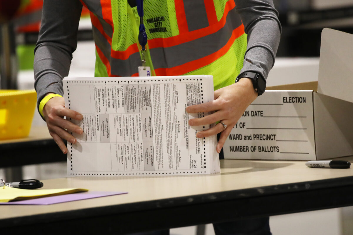 Election workers count ballots
