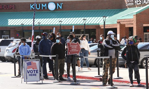 Voting lines outside the Gwinnett County Election Offices in Lawrenceville Georgia on the third day of early voting in the state. The wait was three hours at this site.