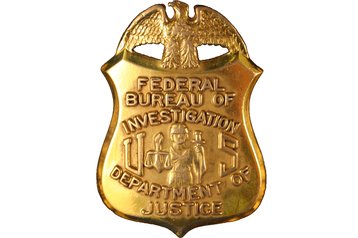 FBI_DoJ_badge_Apr 2021_wiki.jpg