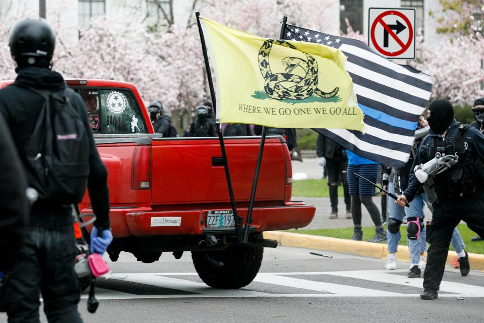 Opposed groups stage protest and counter-protest in Oregon