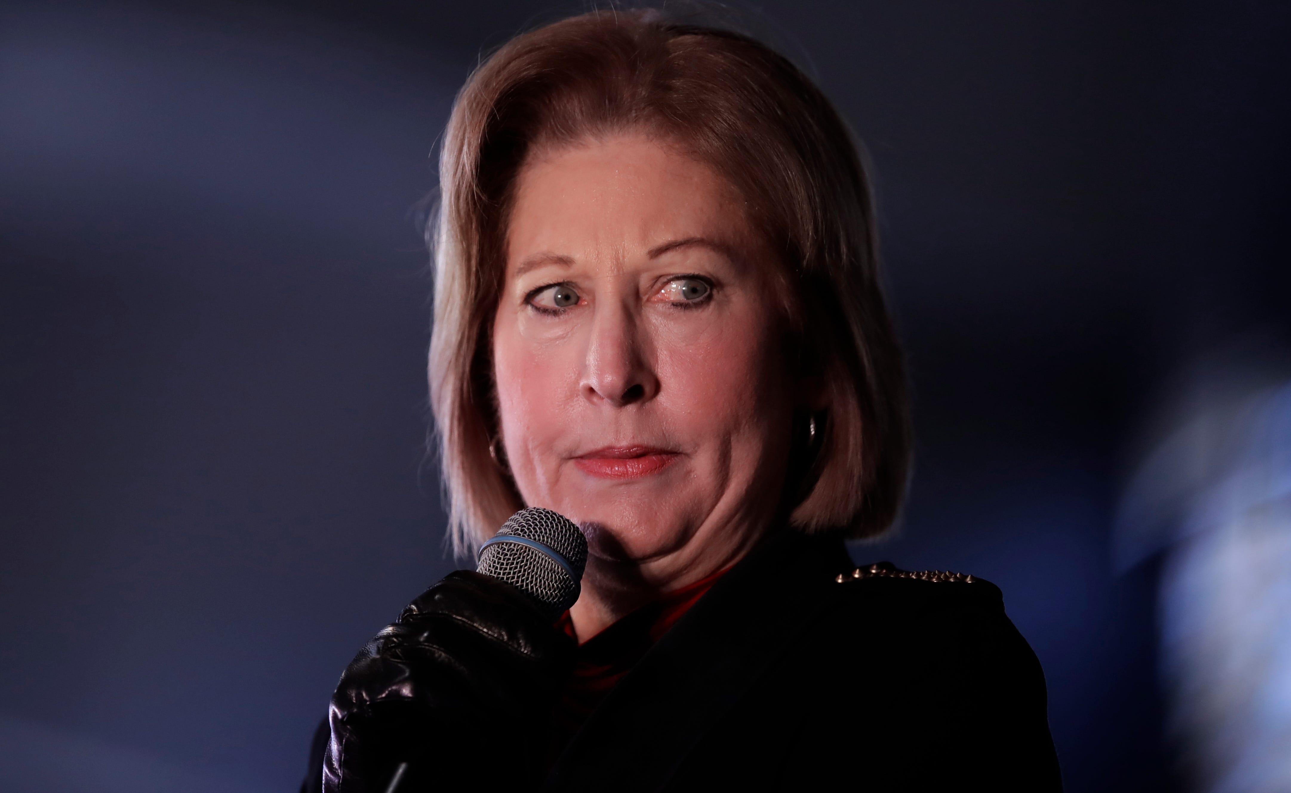 Attorney Sidney Powell, a former member of President Donald Trump's legal team, speaks during a rally Dec. 2, 2020, in Alpharetta, Georgia.