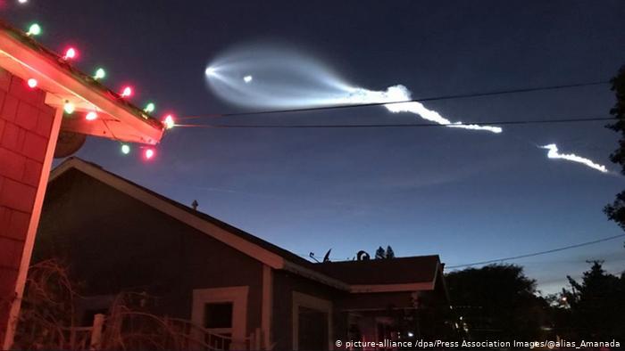 A rocket taking satellites into space seen in the sky over Los Angeles