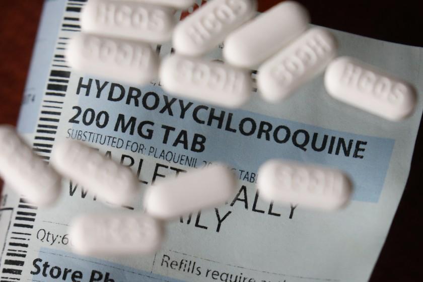 FILE - This Monday, April 6, 2020, file photo shows an arrangement of Hydroxychloroquine pills in Las Vegas. At least 13 states have obtained a total of more than 10 million doses of malaria drugs to treat COVID-19 patients despite warnings from doctors that more tests are needed before the medications that President Trump once fiercely promoted should be used to help people with the coronavirus. (AP Photo/John Locher,File)