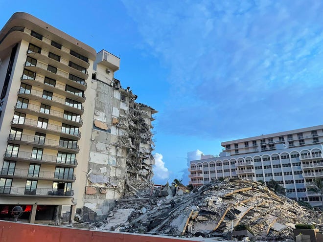 The 12-story Champlain South Tower building partially collapsed early June 24.