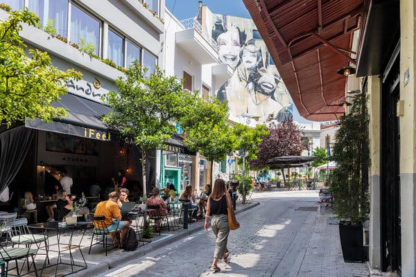 Restaurants and bars lining the alleyways of the Psiri neighborhood of Athens.