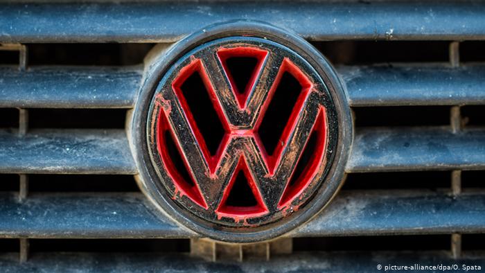 A rusted VW logo