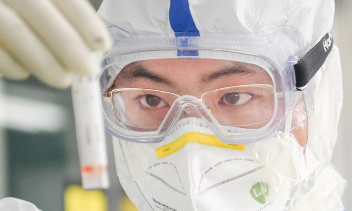 A staff member works in a laboratory in Wuhan, central China's Hubei Province, Feb. 13, 2020. Photo: Xinhua