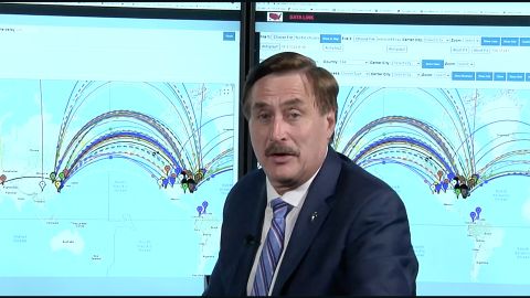 Mike LIndell appearing in a scene from his video, "Absolute Proof."