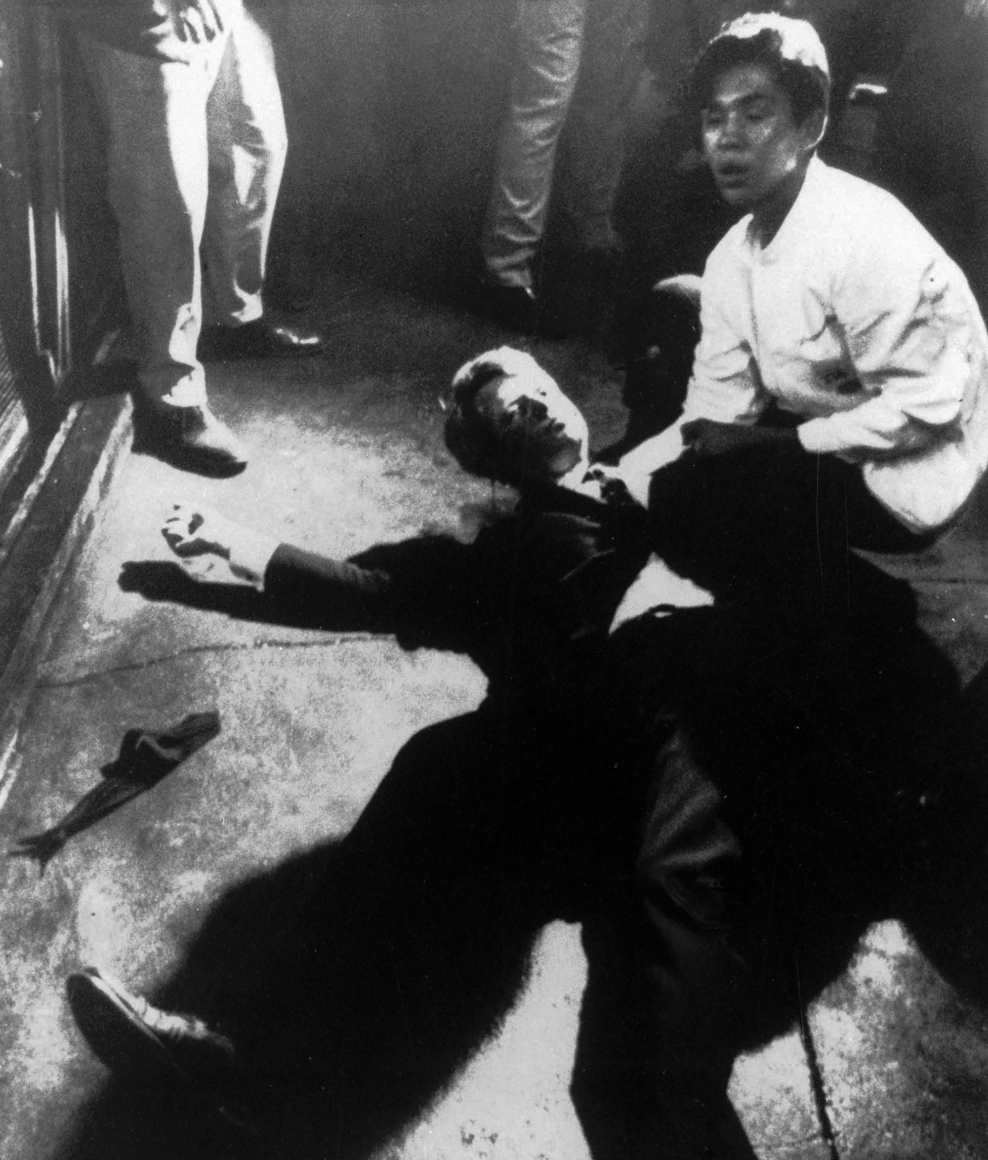 Sen. Robert F. Kennedy lies on the floor of the Ambassador hotel in Los Angeles after he was shot