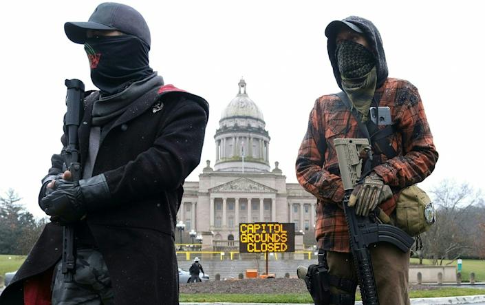 Protesters in front of the state Capitol building in Frankfort, Ky.