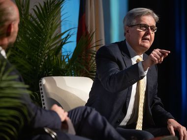 Texas Lt. Governor Dan Patrick (right) speaks with Texas Public Policy Foundation Executive Director Kevin Roberts during the Policy Orientation Opening Keynote Conversation at the AT&T Conference Center in Austin, Texas, on Wednesday, Jan. 13, 2021. In November, Patrick offered cash rewards to anyone who provided proof of voter fraud to law enforcement. (Lynda M. González/The Dallas Morning News)