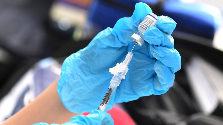 Covid vaccine mandates push some holdouts to get the shot — and then ‘detox’