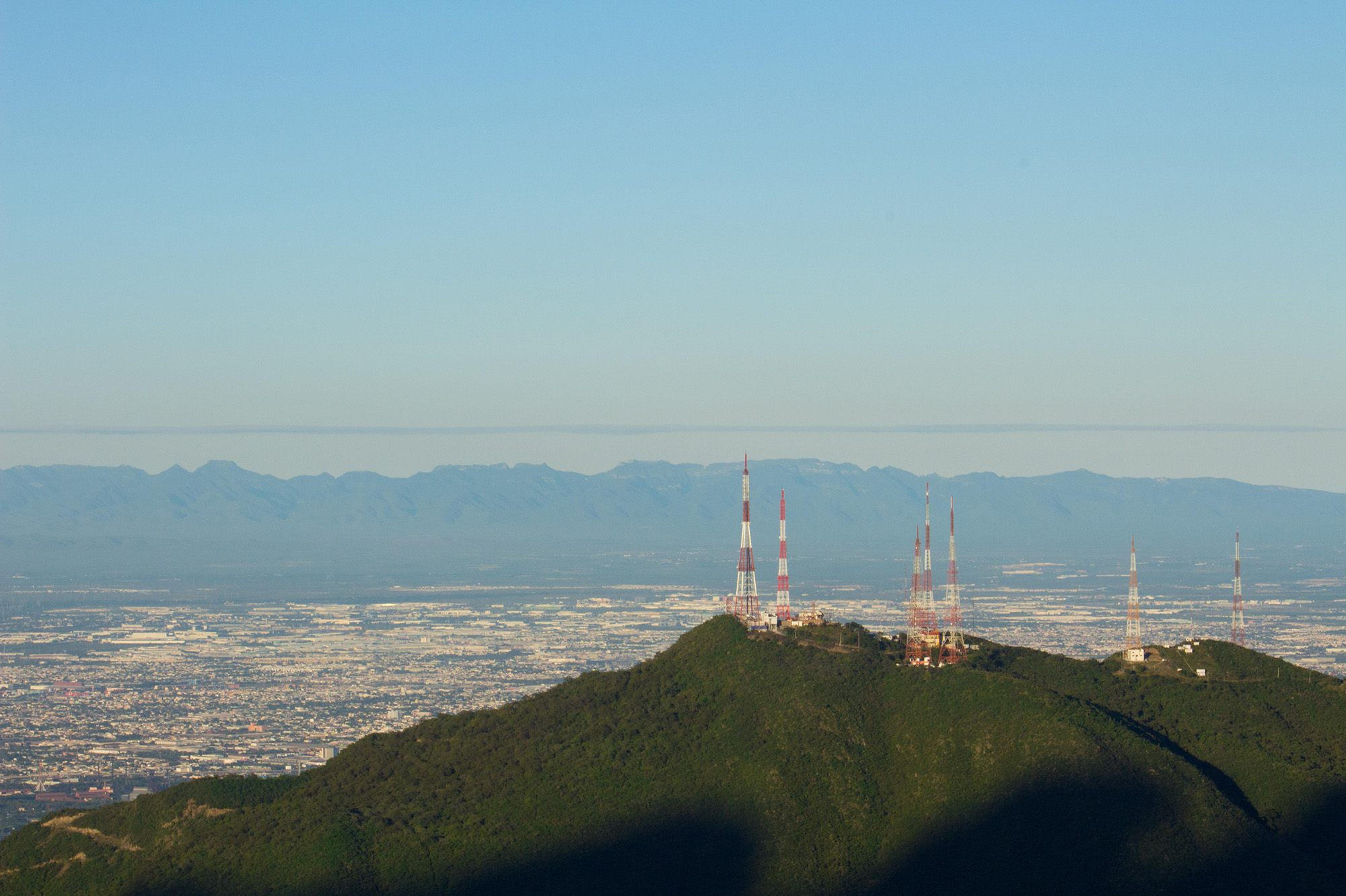 MTA55K Communication towers at Monterrey Mexico city from Chipinque