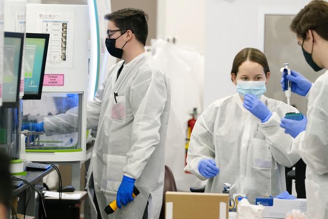 Sonora Quest Laboratory medical laboratory scientists oversee COVID-19 PCR tests at Sonora Quest Laboratories. File image.