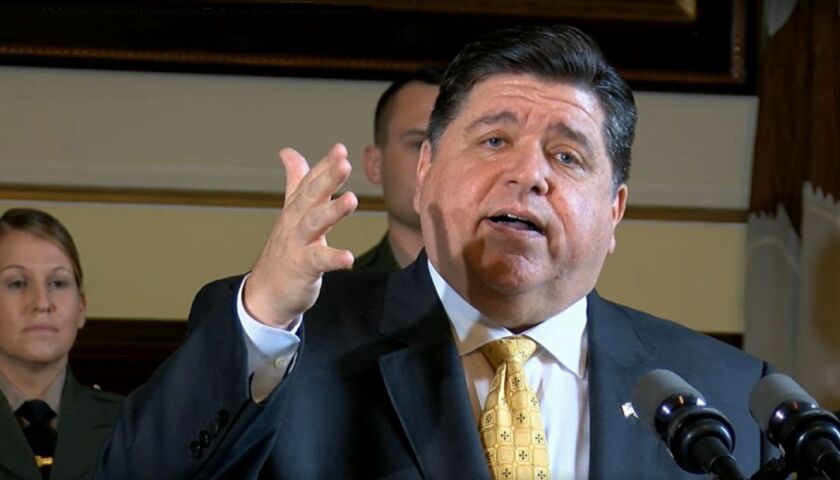 Gov. J.B. Pritzker speaks at a news conference at the state Capitol on Tuesday.