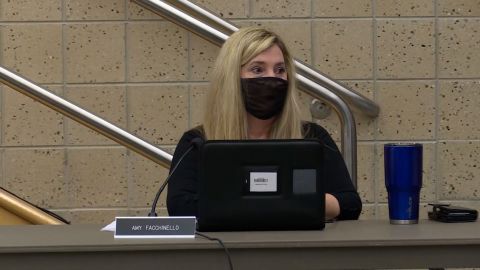 Amy Facchinello listens to students and parents expressing their views at a school board meeting last month.