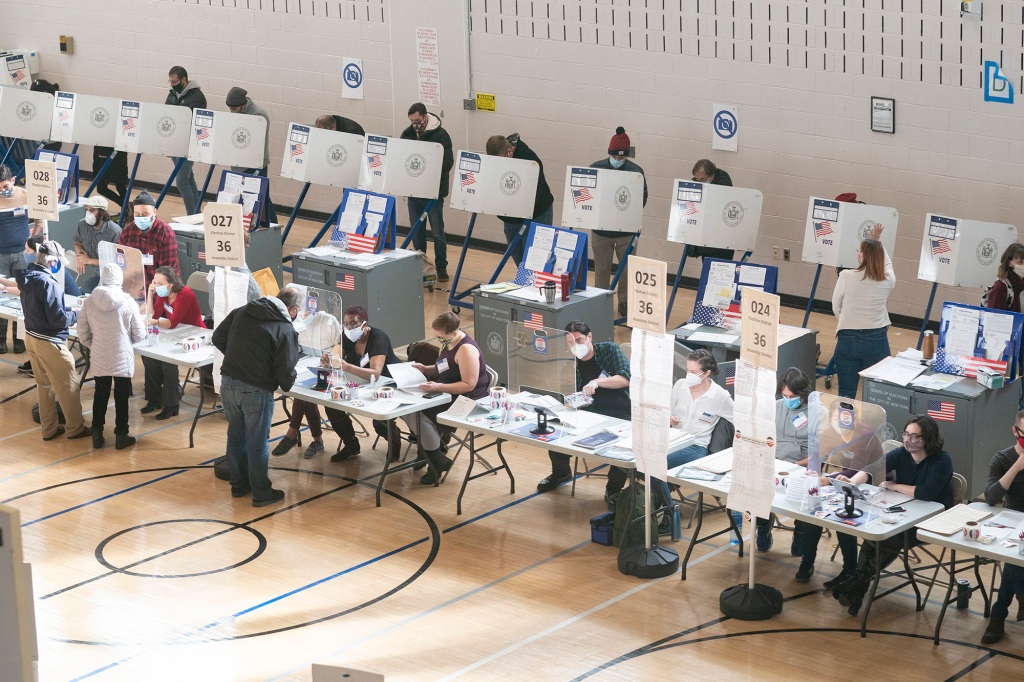 Residents of Astoria vote during the 2020 election, the voting lines were long at PS 70.