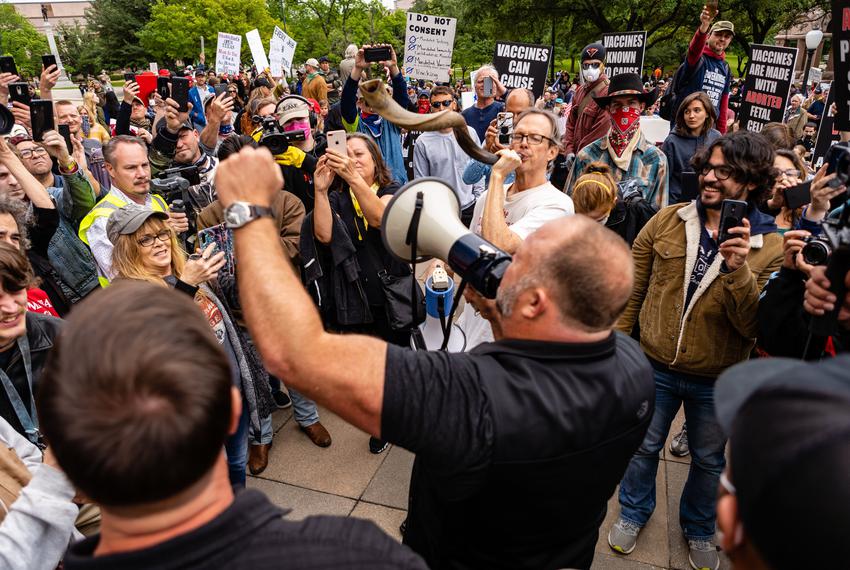 Infowars Founder Alex jones speaks to a crowd gathered at the Texas State Capital in protest of economic shutdowns amid the …