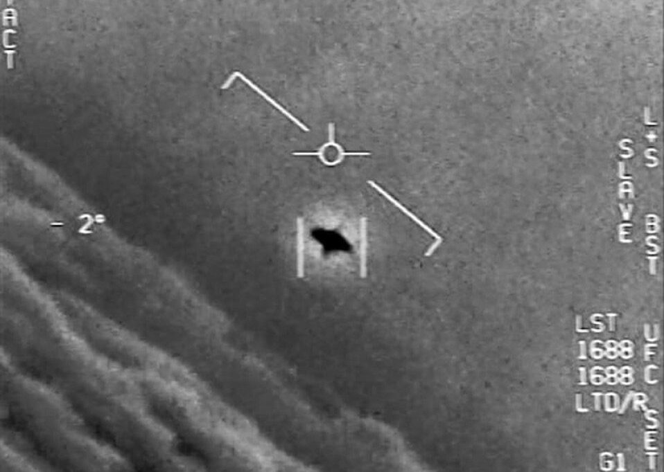 UFO or UAP: A screenshot from the video called "FLIR1" depicts an oblong-shaped object from documented in the "2004 Nimitz incident." Screenshot