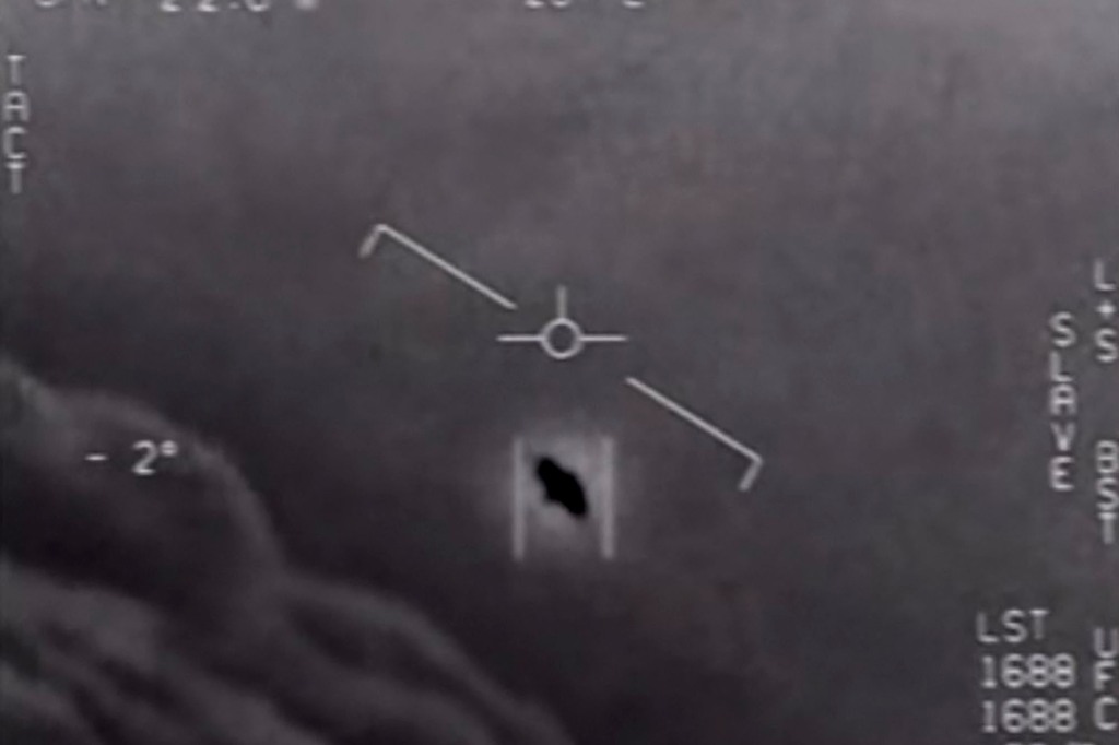 This video grab image courtesy of the US Department of Defense shows part of an unclassified video taken by Navy pilots that have circulated for years showing interactions with "unidentified aerial phenomena."