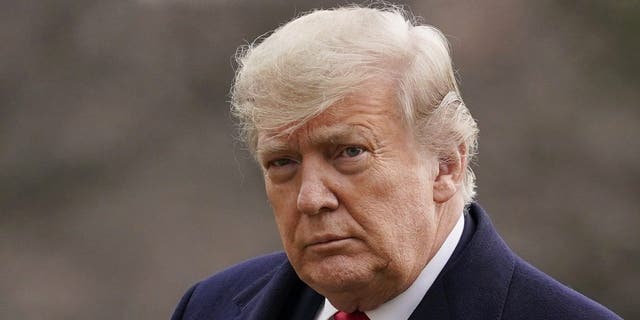 President Donald Trump arrives on the South Lawn of the White House on Dec. 31, 2020.