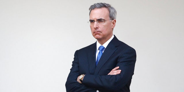 White House counsel Pat Cipollone listens as President Donald Trump speaks during a coronavirus task force briefing at the White House, March 29, 2020. 