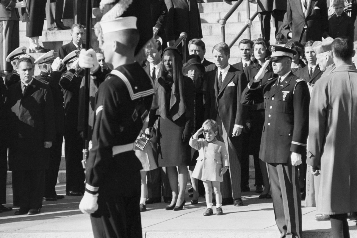 John F. Kennedy Jr. saluting as the casket of his father, the late President John F. Kennedy, is carried from St. Matthew's Cathedral in Washington, D.C.