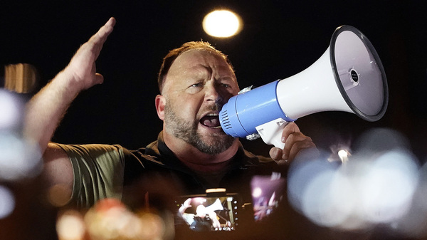 A jury has ordered conspiracy theorist Alex Jones to pay millions of dollars for spreading lies about the Sandy Hook school massacre. But his influence in right-wing media and politics remains strong.