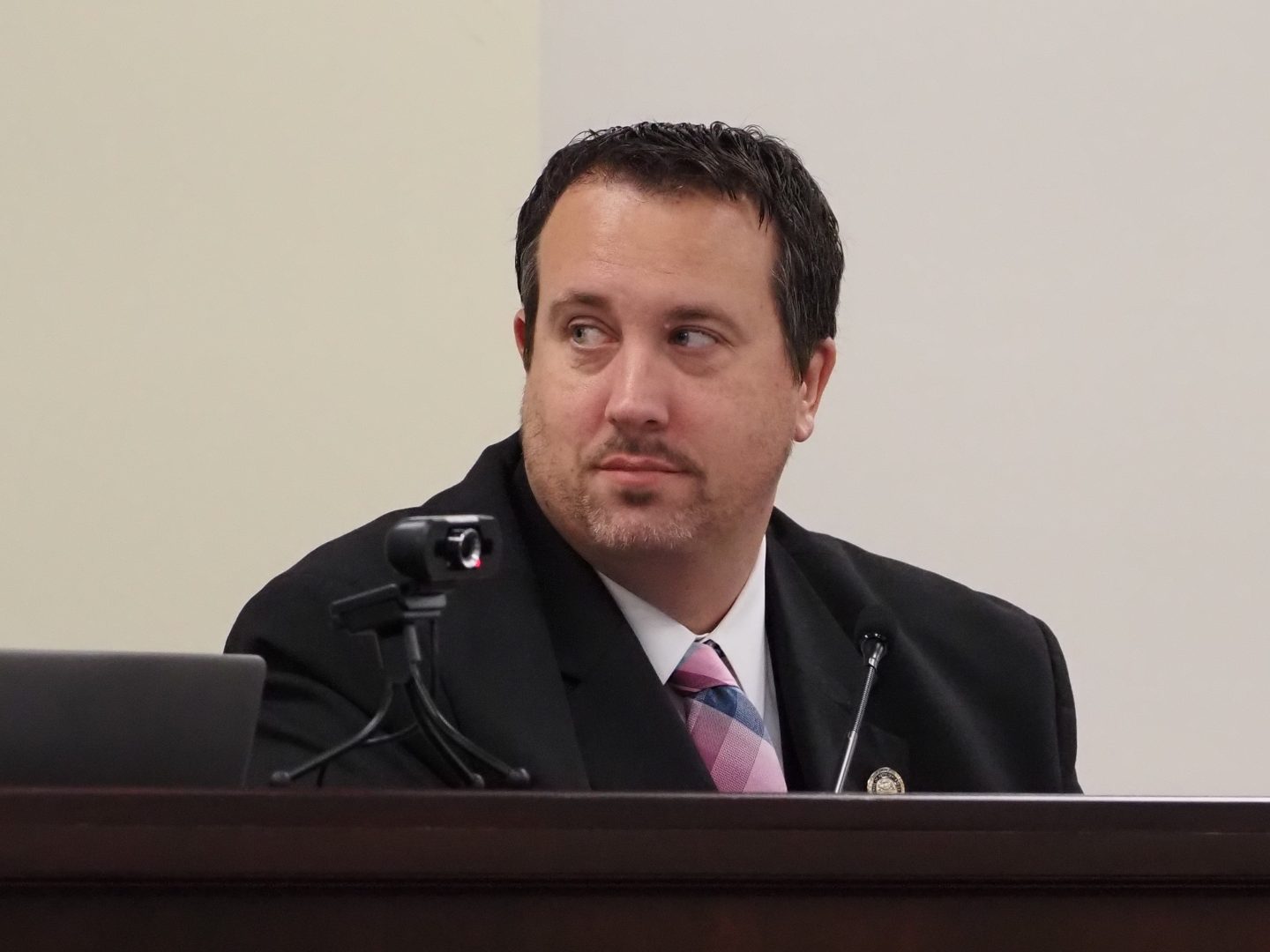 State Rep. Seth Grove (R-York) looks on as a fellow lawmaker speaks at a meeting of the House State Government committee on Jan 10, 2022. 