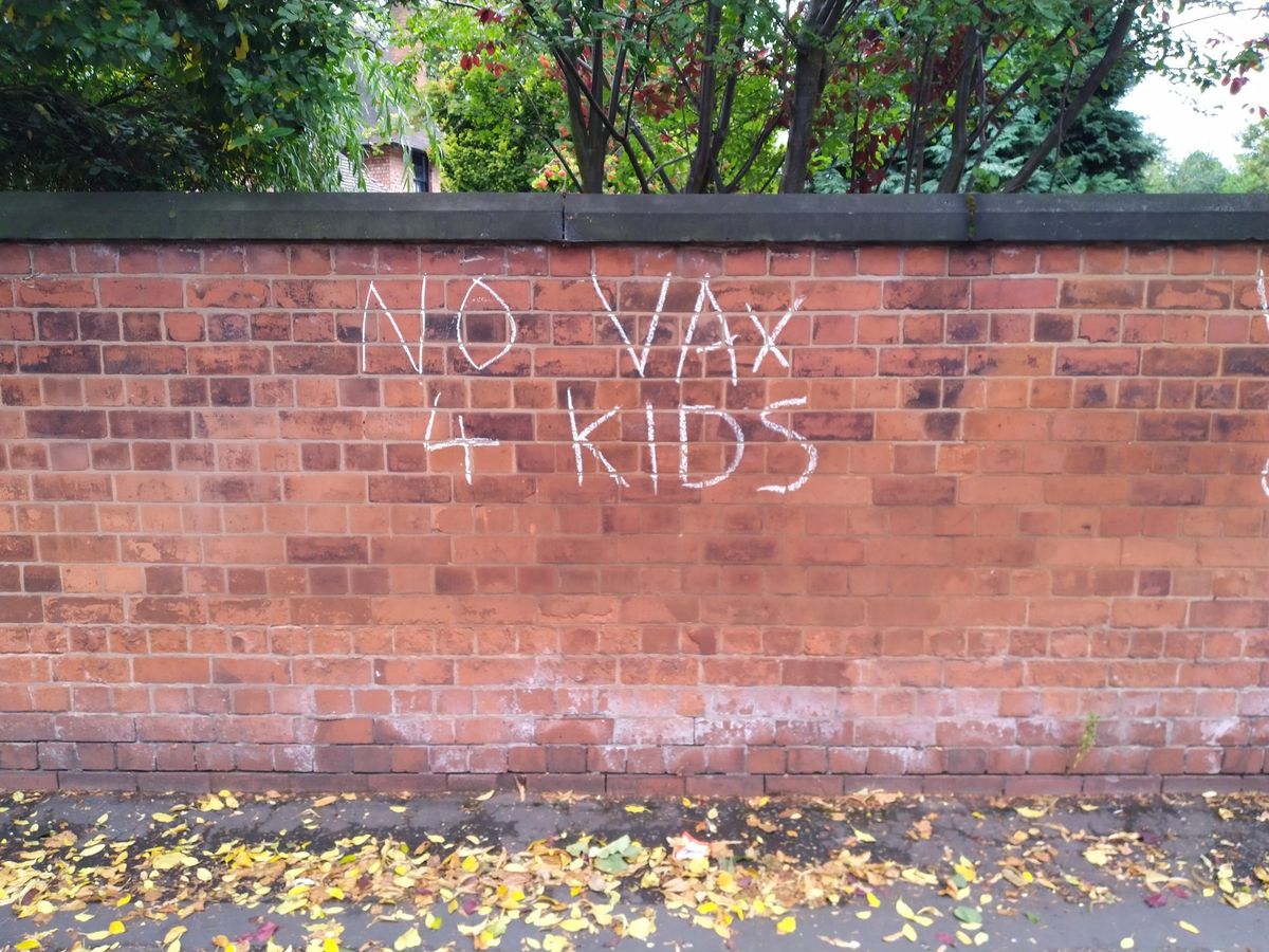 Anti-vax graffiti has been sprayed onto walls on Park Avenue, near to West Park. Photo: Councillor Craig Collingswood