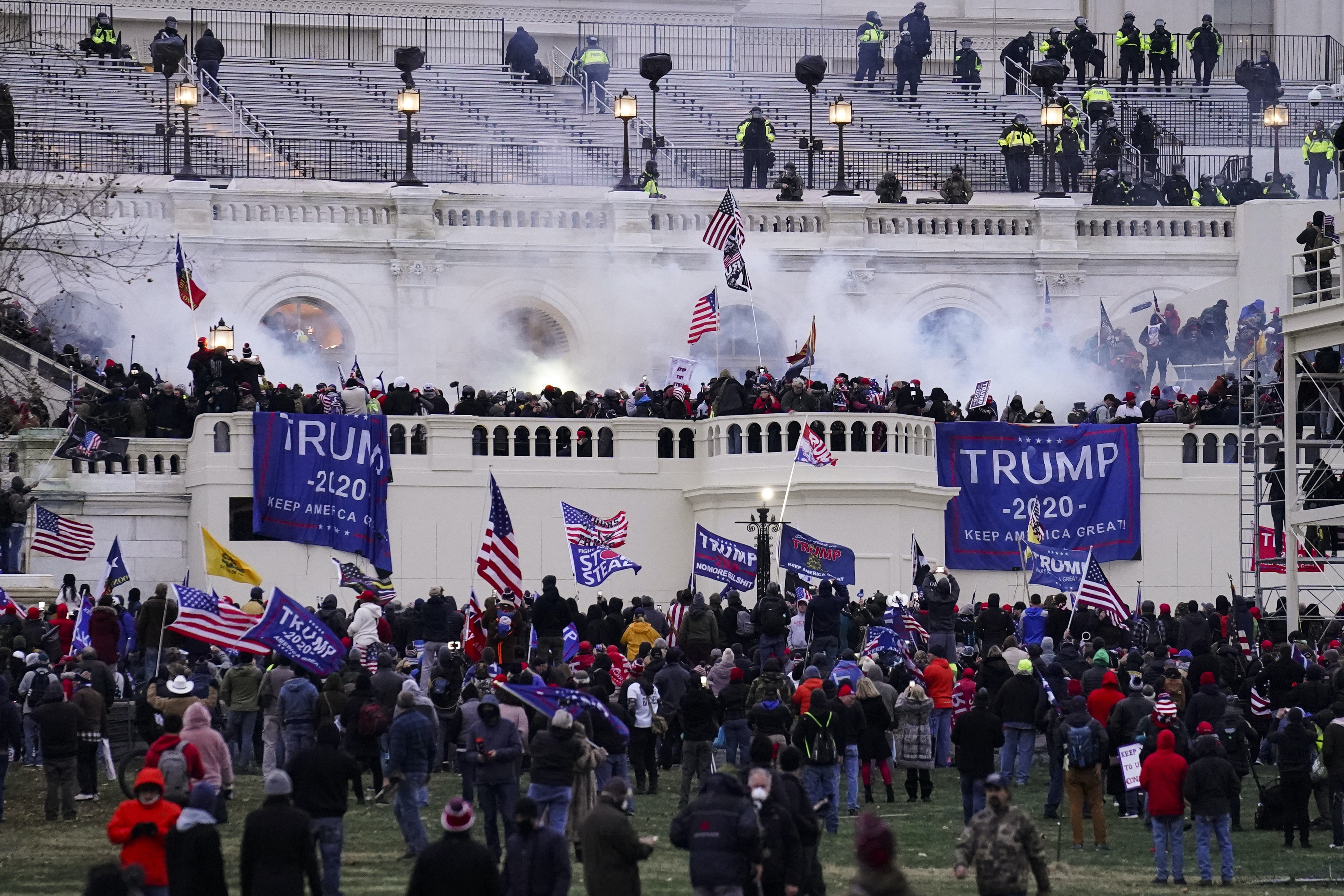 A crowd storms the U.S. Capitol building.