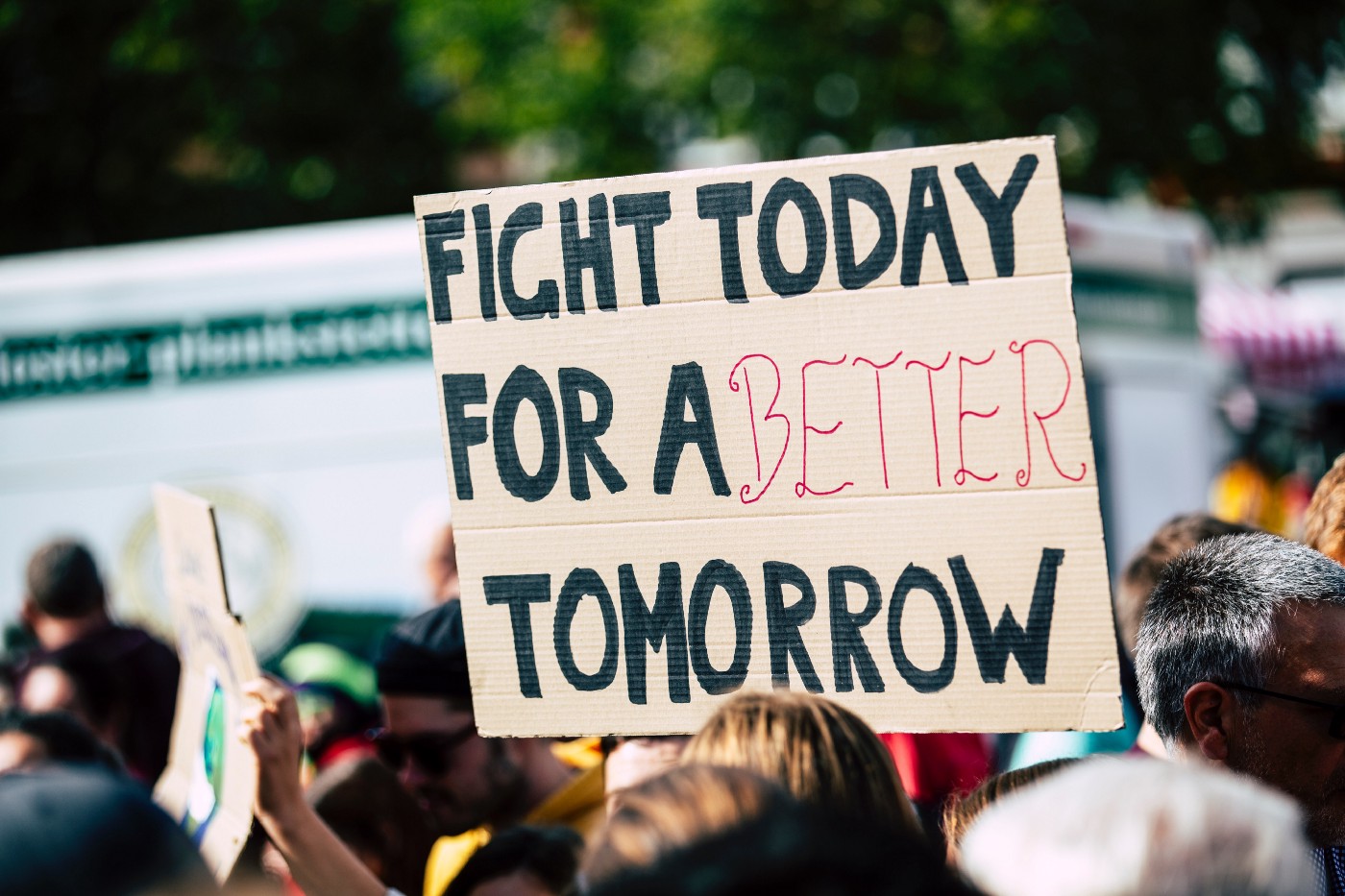 The great reset the serfdom — a protestor sign that reads “fight today for a better tomorrow”