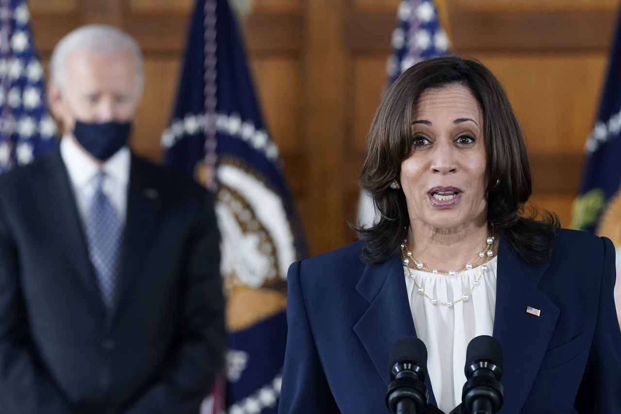 President Joe Biden listens as Vice President Kamala Harris speaks after meeting with leaders from Georgia's Asian-American and Pacific Islander community, Friday, March 19, 2021, at Emory University in Atlanta. (AP Photo/Patrick Semansky)