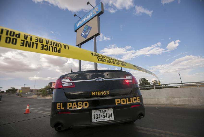 A police unit at the back entrance to a Walmart where a gunman opened fire on back-to-school shoppers on Aug. 3, 2019, in El Paso.