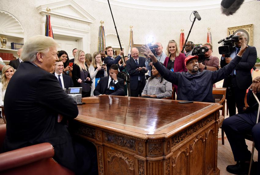 In this file photo, then-President Donald Trump met with Kanye West (now known as Ye) in the White House on Oct. 11, 2018. Trump met again with Ye and avowed fascist Nick Fuentes.