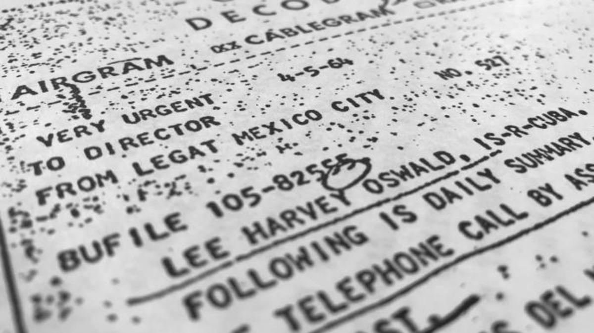 Part of a file, dated April 5, 1964, details efforts to trace Lee Harvey Oswald's travel from Mexico City back to the United States. (Credit: Jon Elswick/AP Photo)