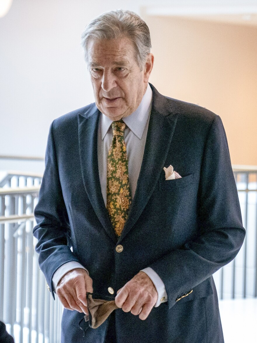 Paul Pelosi, the husband of House Speaker Nancy Pelosi, follows his wife as she arrives for her weekly news conference on Capitol Hill in March.