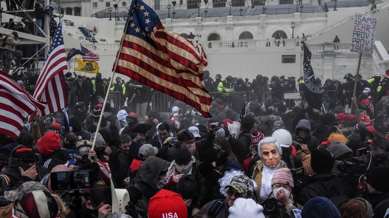 Supporters of U.S. President Donald Trump face off with police during a "Stop the Steal" protest outside of the Capitol building in Washington D.C. U.S. January 6, 2021. Picture taken January 6, 2021. REUTERS/Stephanie Keith 