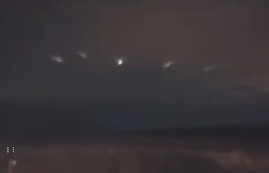 Orb-like UFOs seen 'flying in formation' over countryside sparking probe