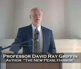 Dr. Griffin speaking at a podium when his book, The New Pearl Harbor, was released.