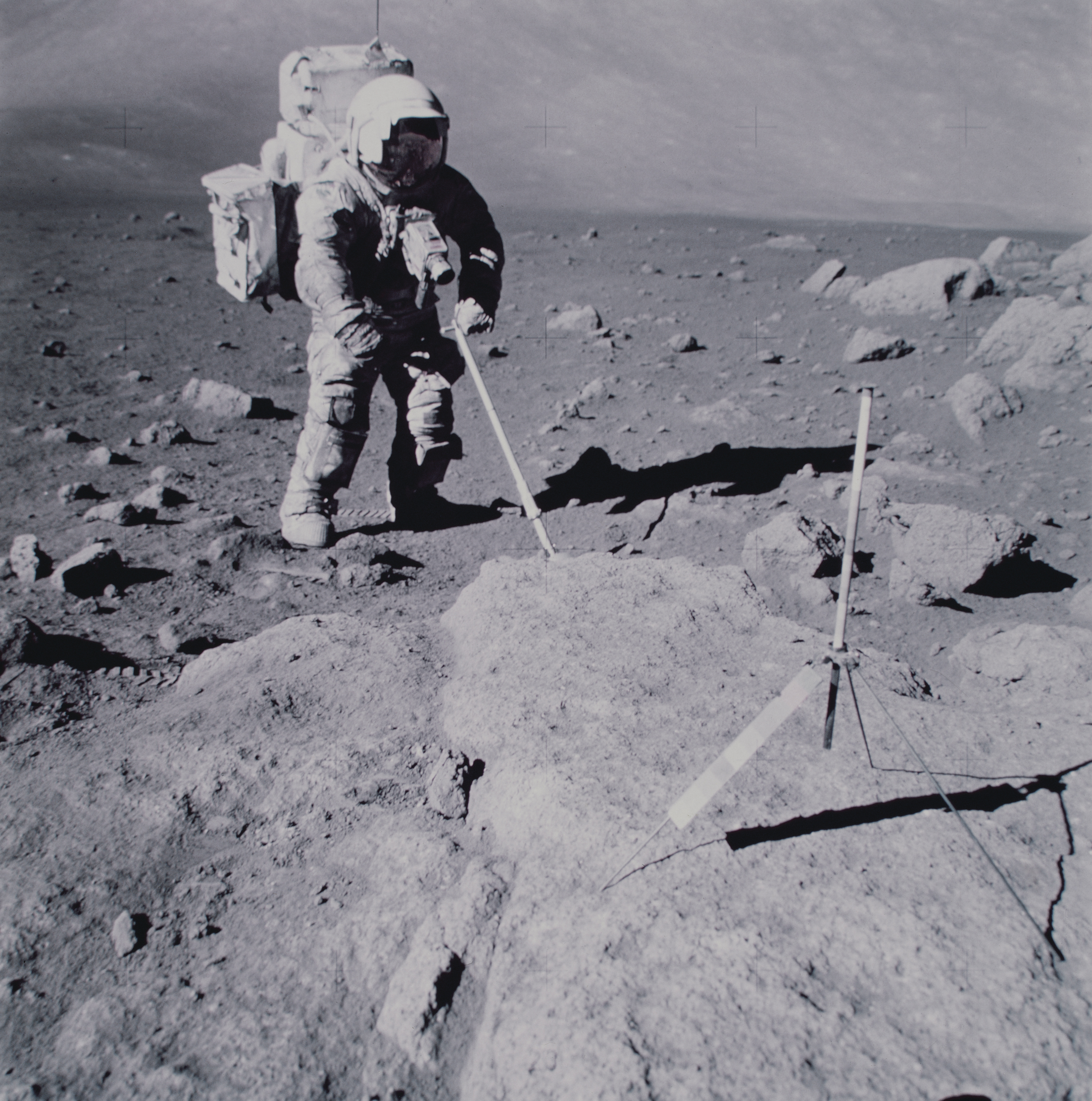 Astronaut Harrison H. Schmitt is seen here collecting samples on the Moon in 1972