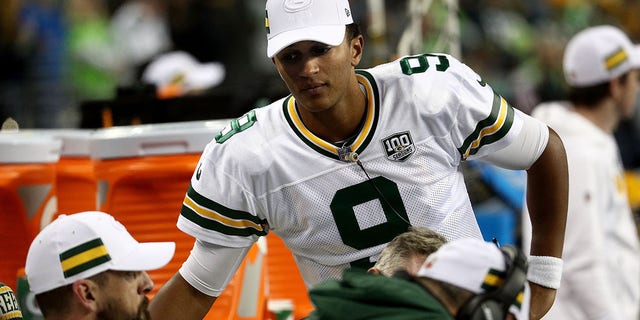 Aaron Rodgers, left, and DeShone Kizer of the Green Bay Packers react on the sidelines against the Seattle Seahawks in the fourth quarter during a game at CenturyLink Field Nov. 15, 2018, in Seattle.