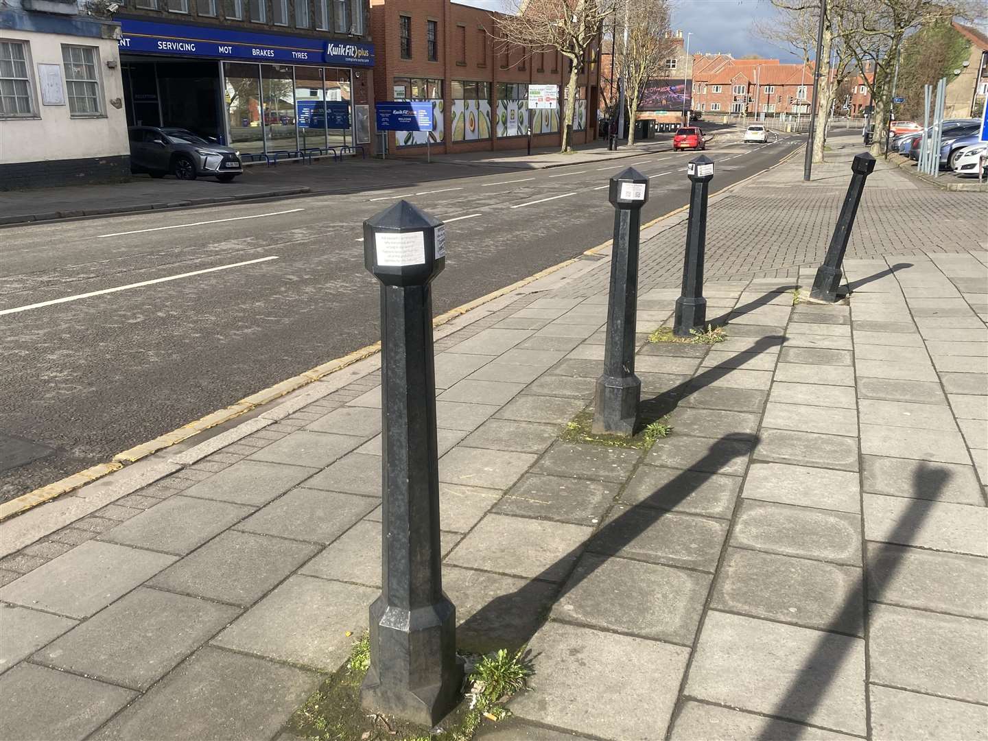 Stickers on posts alongside Watergate in Grantham. (62668952)