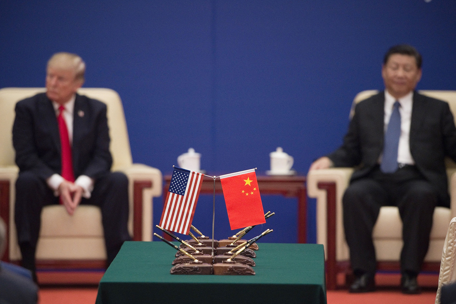 U.S. President Donald Trump and Xi attend a business leaders event inside the Great Hall of the People in Beijing in 2017.