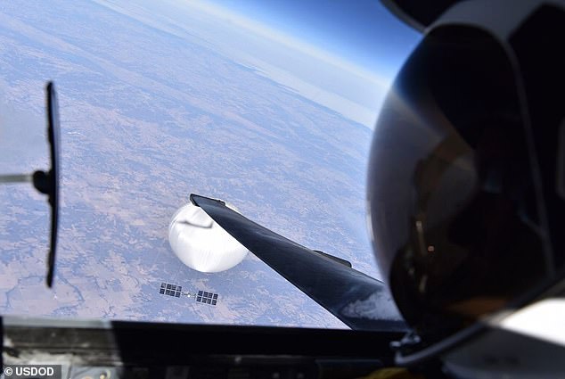 The All-domain Anomaly Resolution Office (AARO) was set up by the Pentagon in July 2022 to probe UFO sightings in the US. The office has allegedly been slow to grow and is desperate for funding. US Air Force pilot is pictured looking down at the Chinese spy balloon