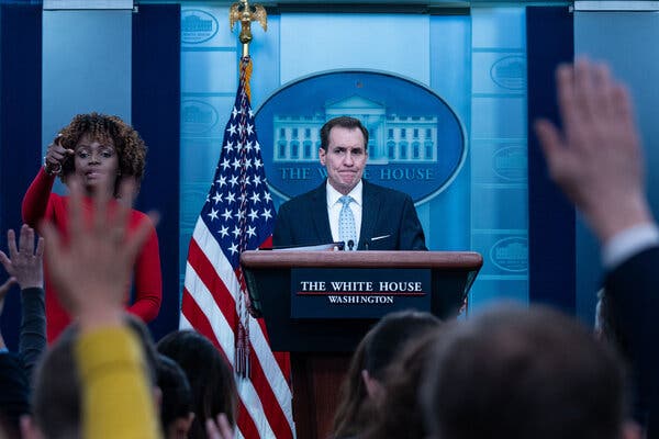 White House spokesman John Kirby behind a podium at the White House